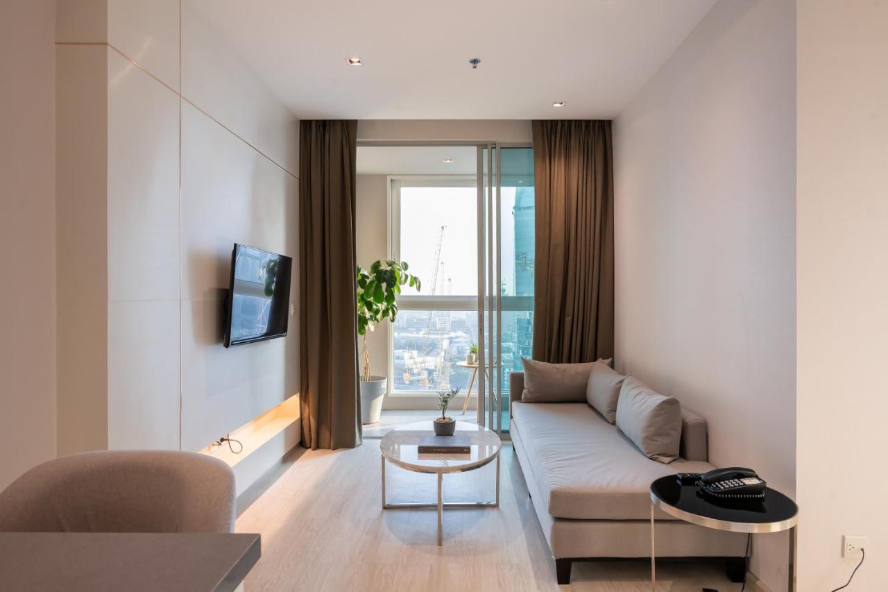 Jasmine 59 Hotel بانكوك المظهر الخارجي الصورة A living room in a micro apartment