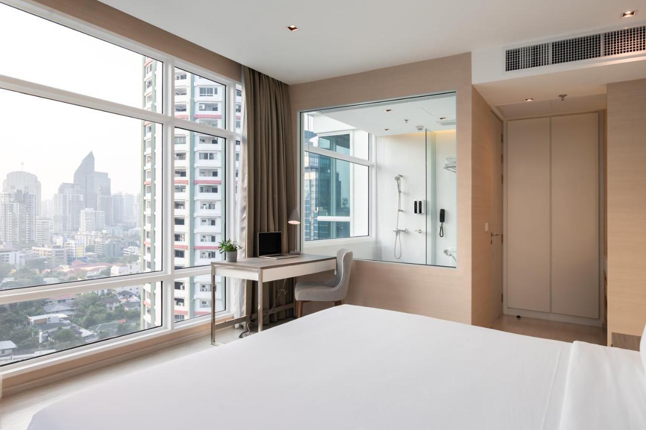 Jasmine 59 Hotel بانكوك المظهر الخارجي الصورة A bedroom at the hotel