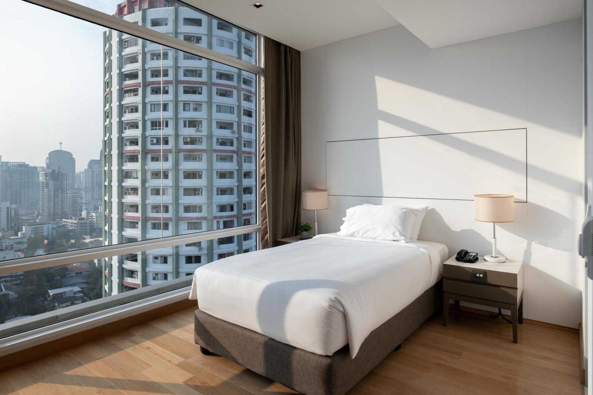 Jasmine 59 Hotel بانكوك المظهر الخارجي الصورة A bedroom at the hotel