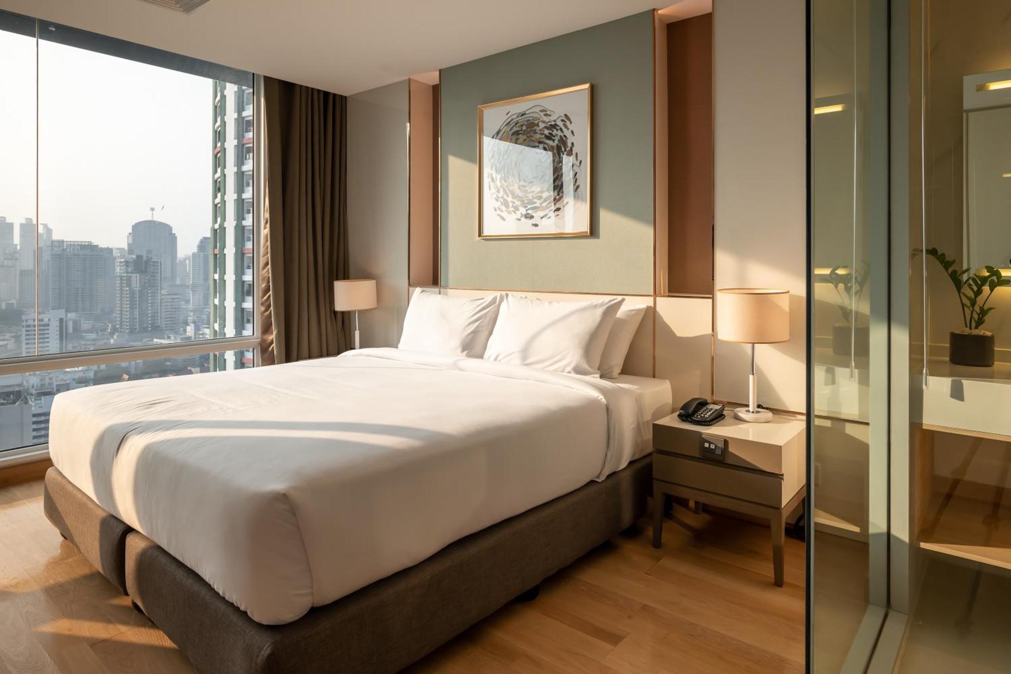 Jasmine 59 Hotel بانكوك المظهر الخارجي الصورة A bedroom at the hotel